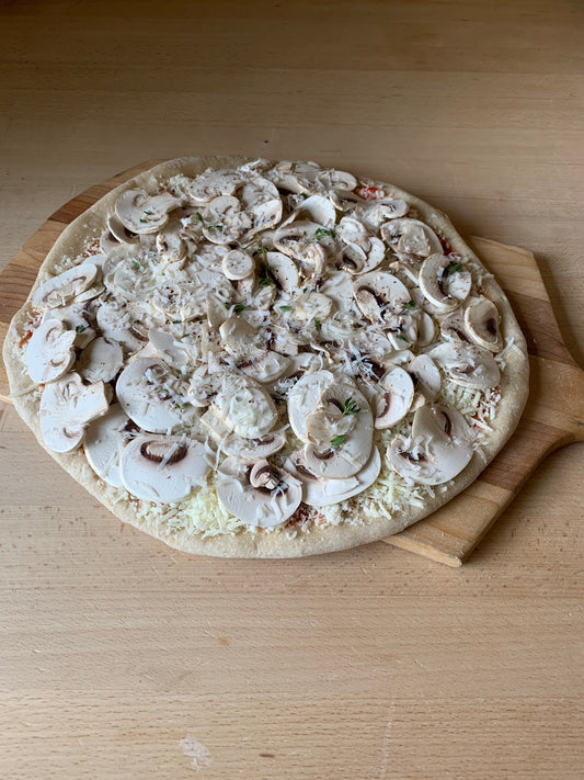 Funghi Pizza- Red or white sauce, mushrooms, mozzarella, parmesan, fresh thyme, cracked pepper.